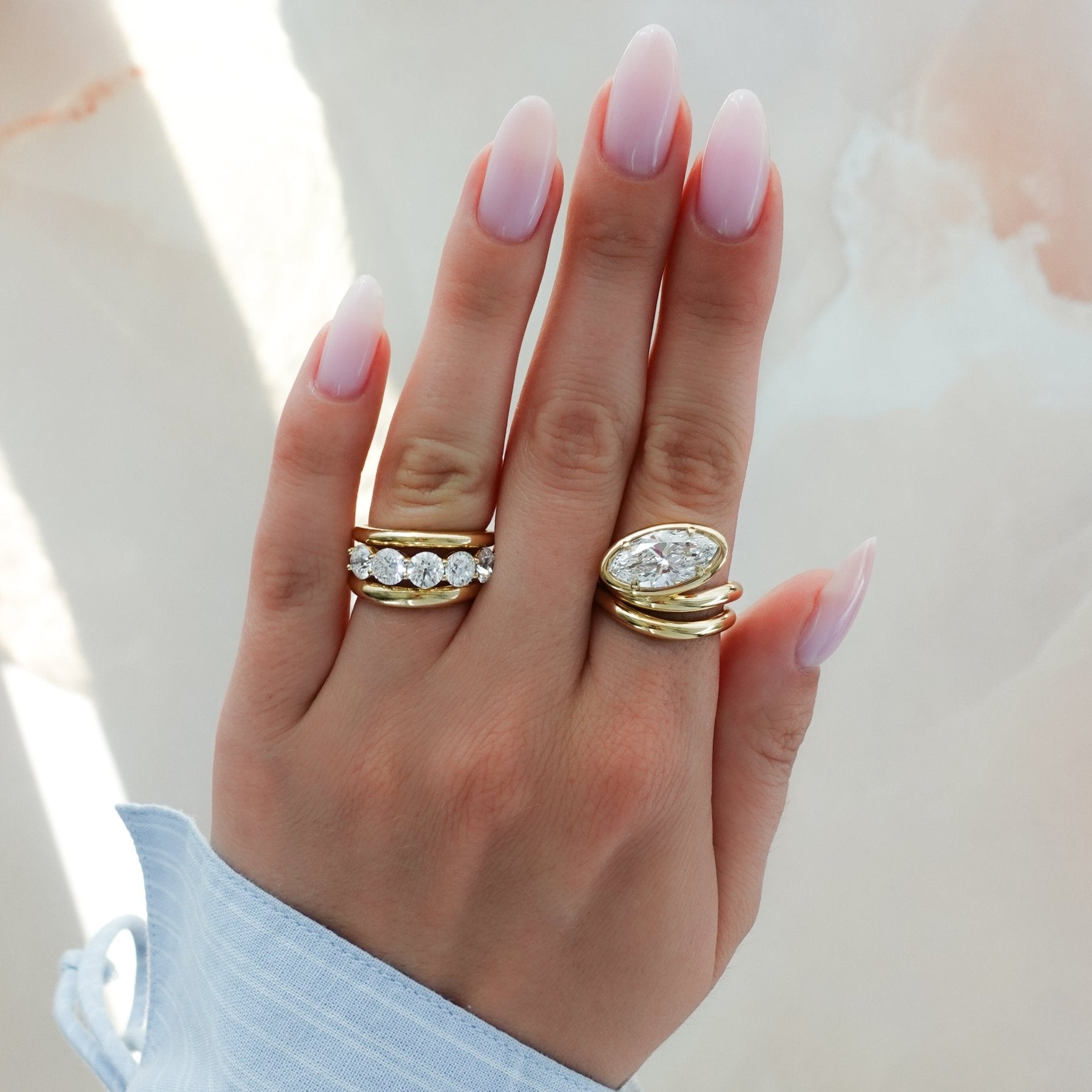 Contoured Club Engagement Ring with a Marquise Cut Diamond