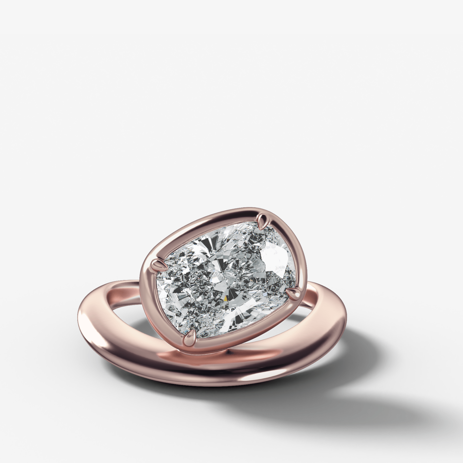 Contoured Club Engagement Ring with an Elongated Cushion Cut Diamond