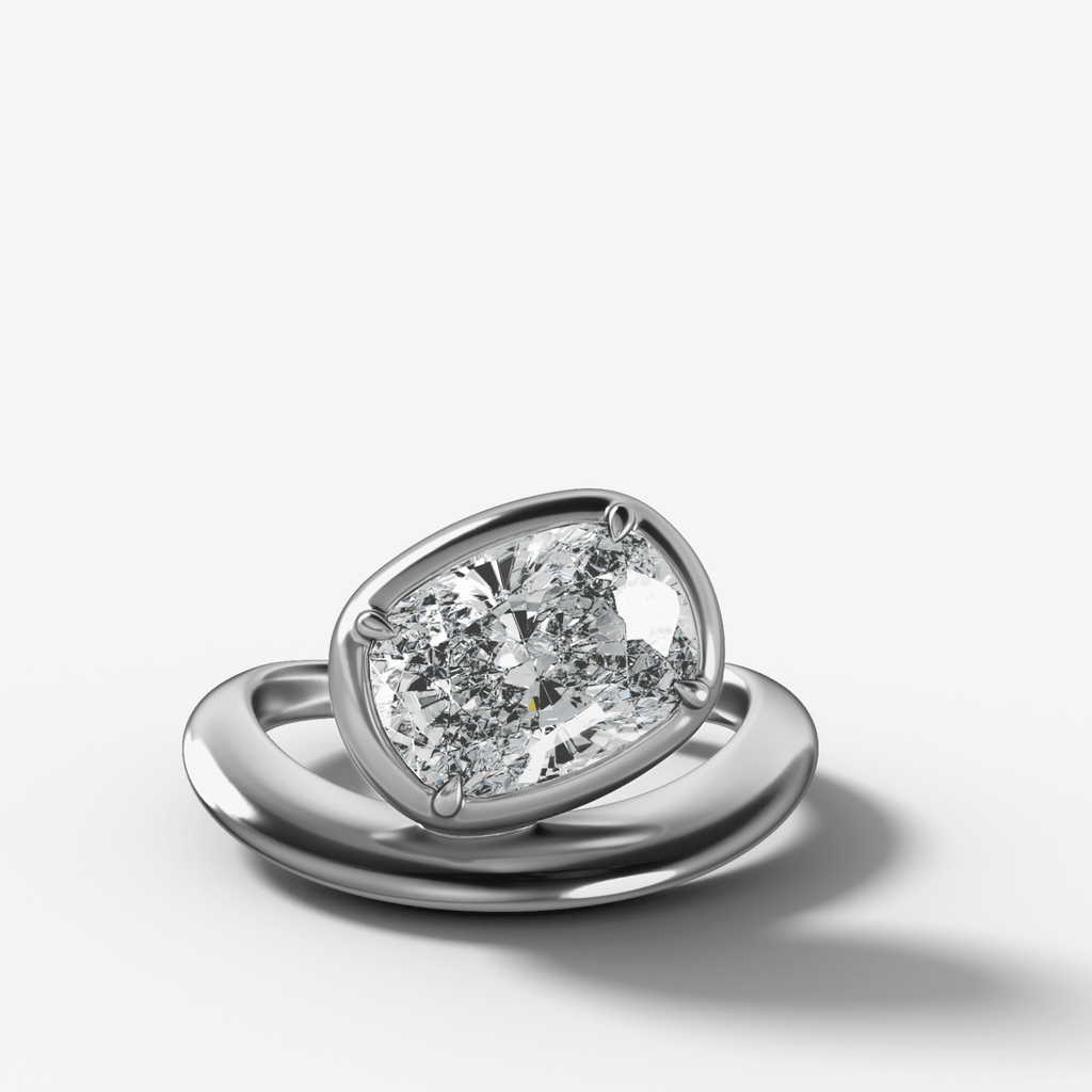 Contoured Club Engagement Ring with an Elongated Cushion Cut Diamond