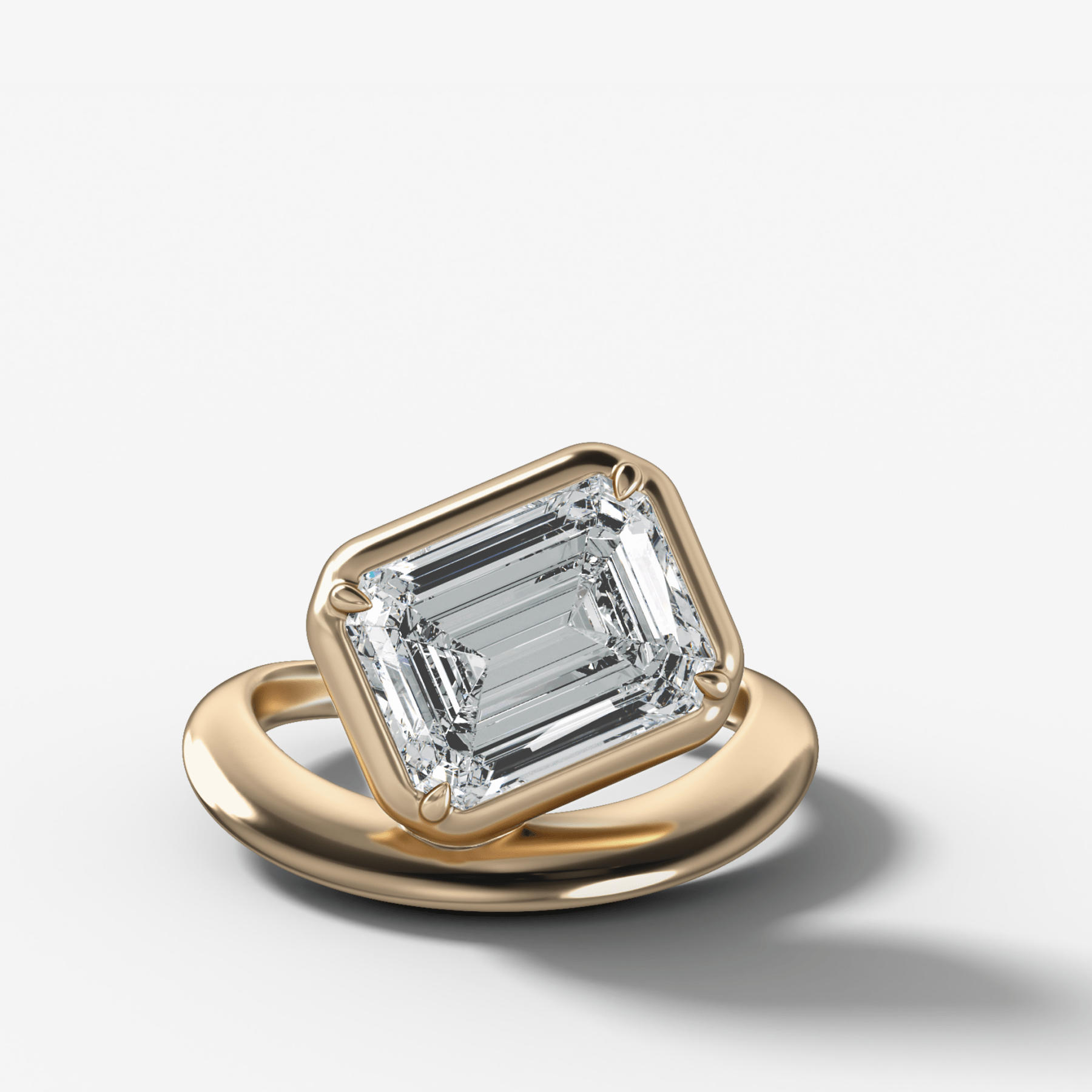Contoured Club Engagement Ring with an Emerald Cut Diamond
