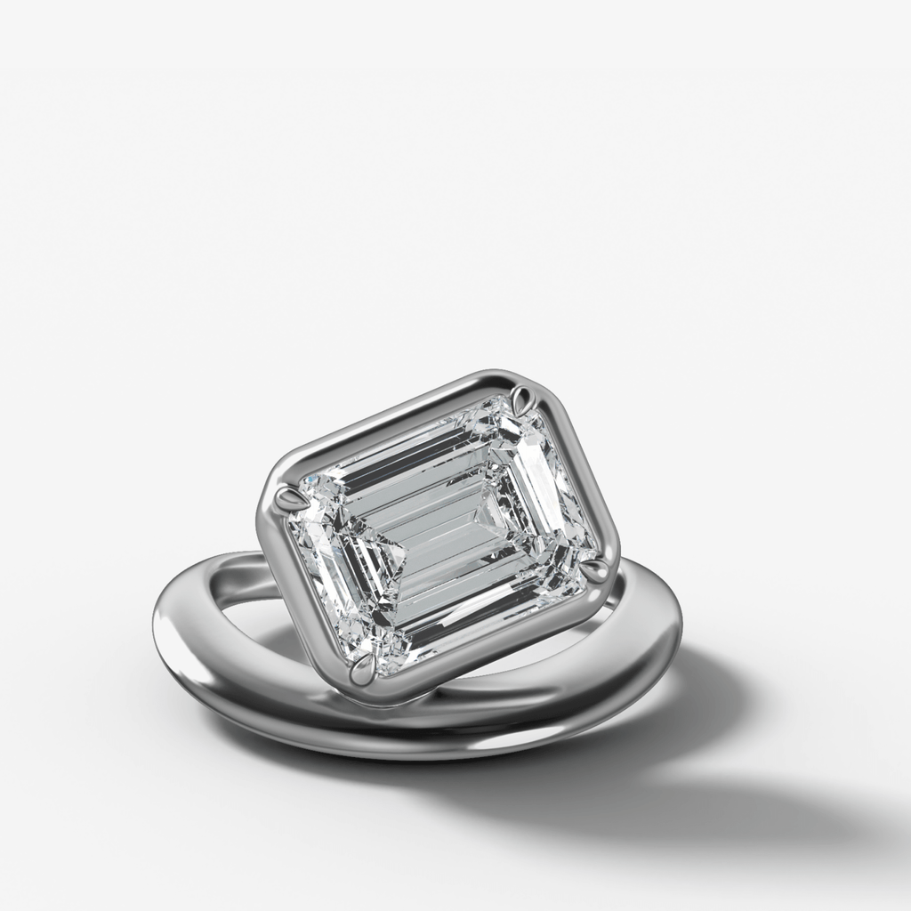 Contoured Club Engagement Ring with an Emerald Cut Diamond