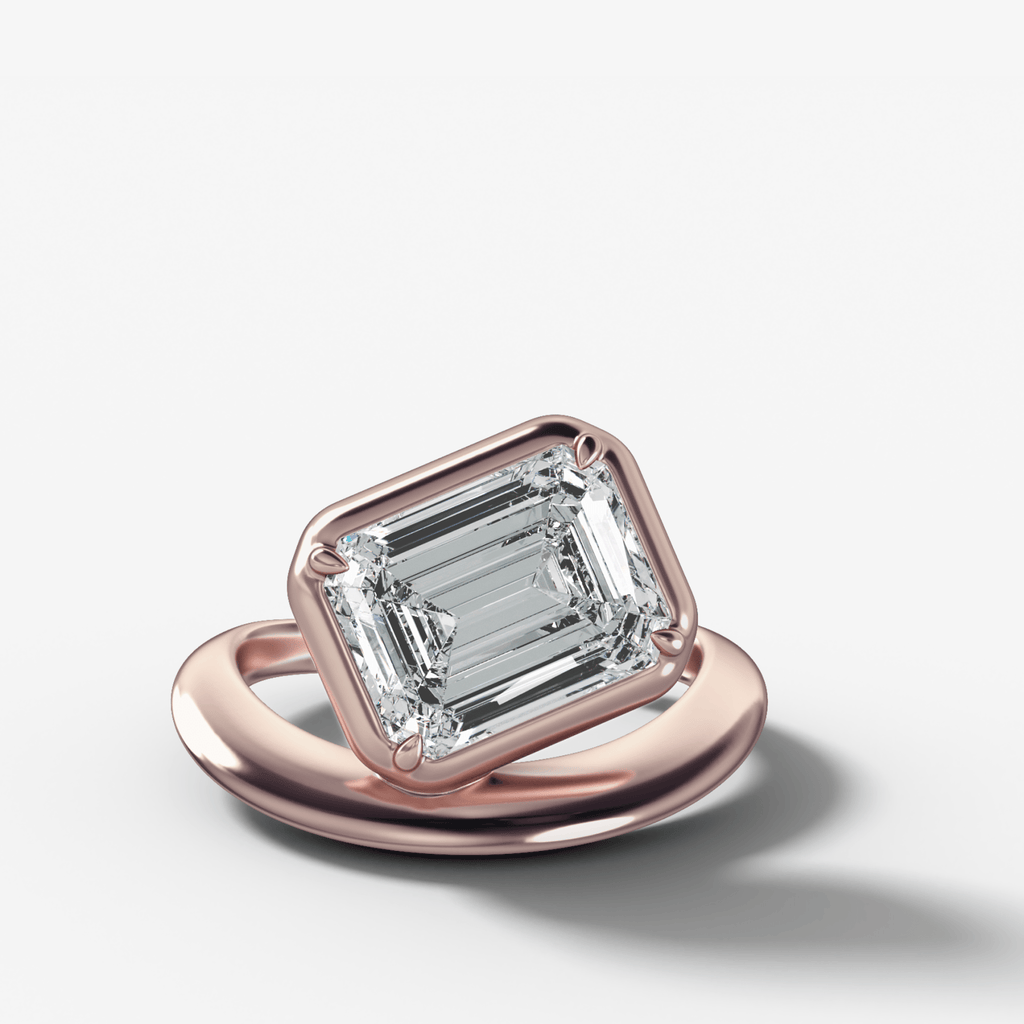 Contoured Club Engagement Ring with an Emerald Cut Diamond