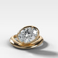 Contoured Club Engagement Ring with an Oval Cut Diamond