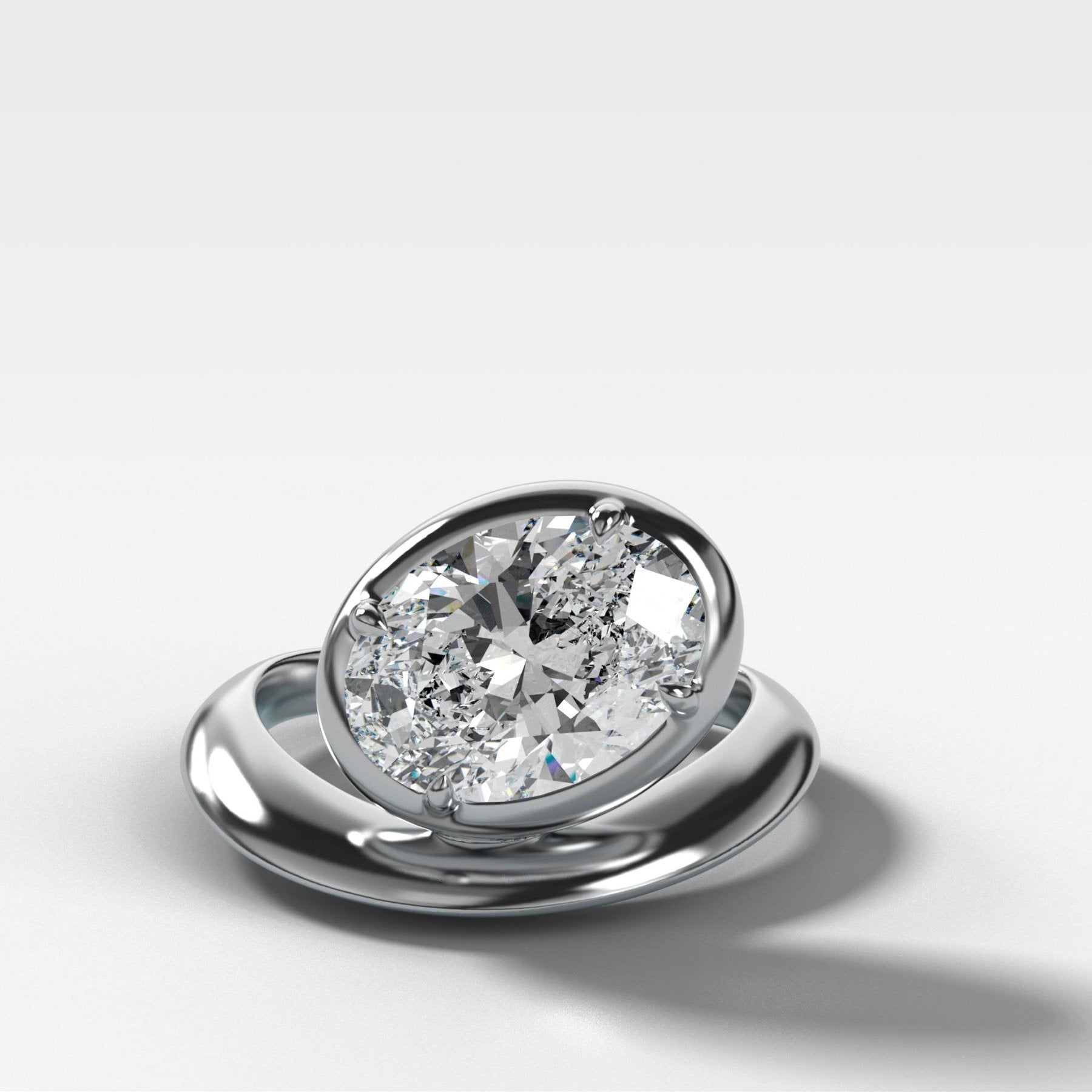 Contoured Club Engagement Ring with an Oval Cut Diamond