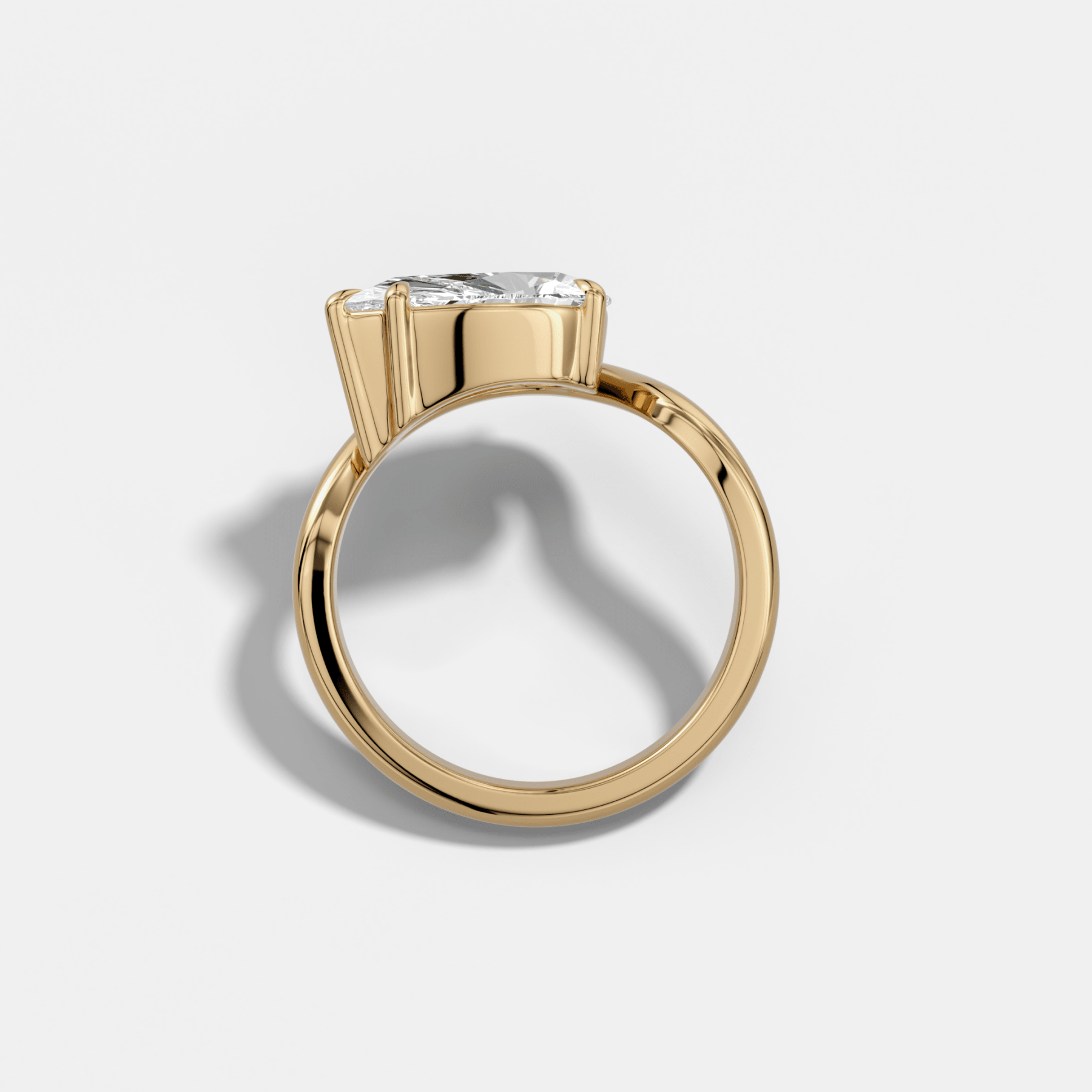 Contoured Engagement Ring with a Pear Cut Diamond