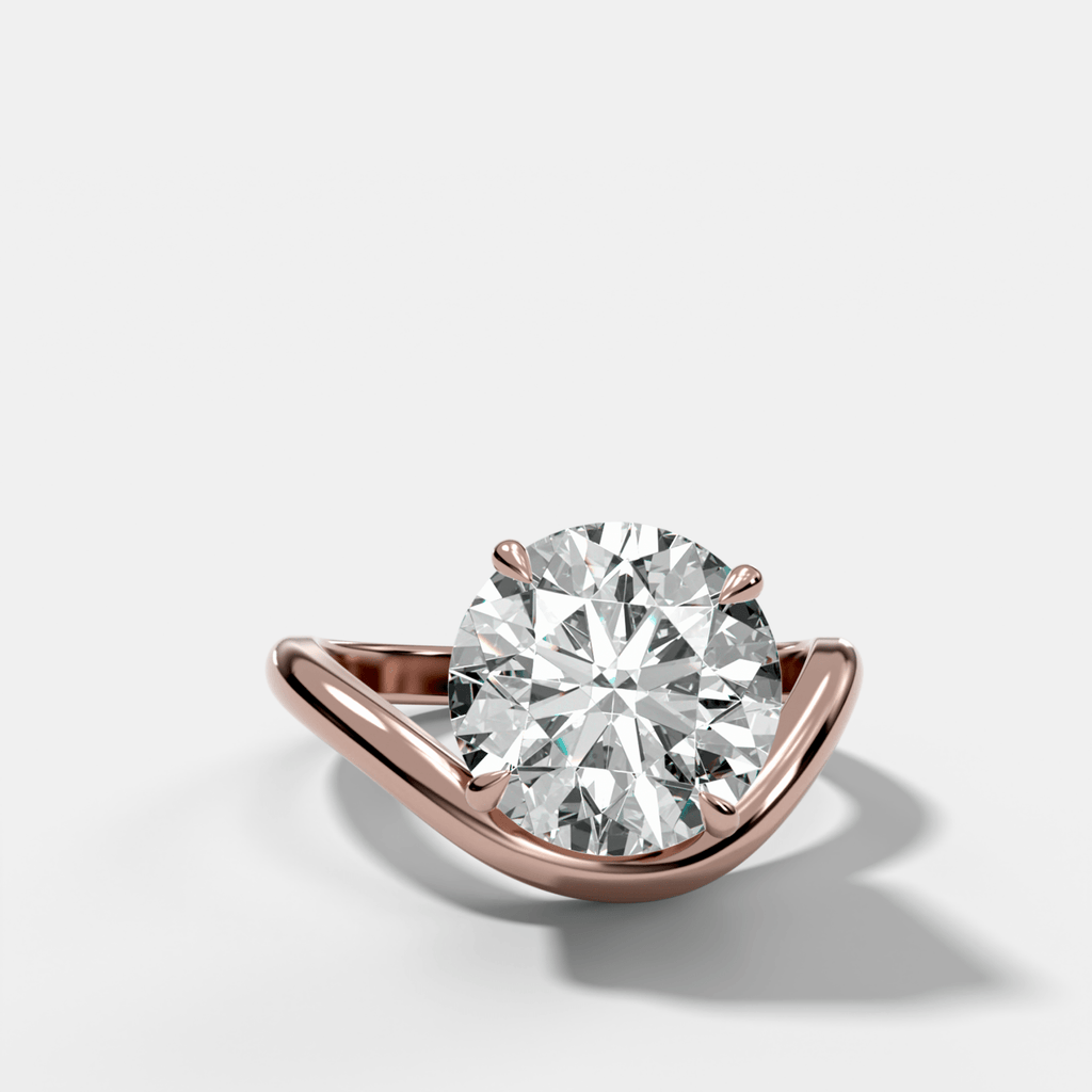 Contoured Engagement Ring with a Round Cut Diamond