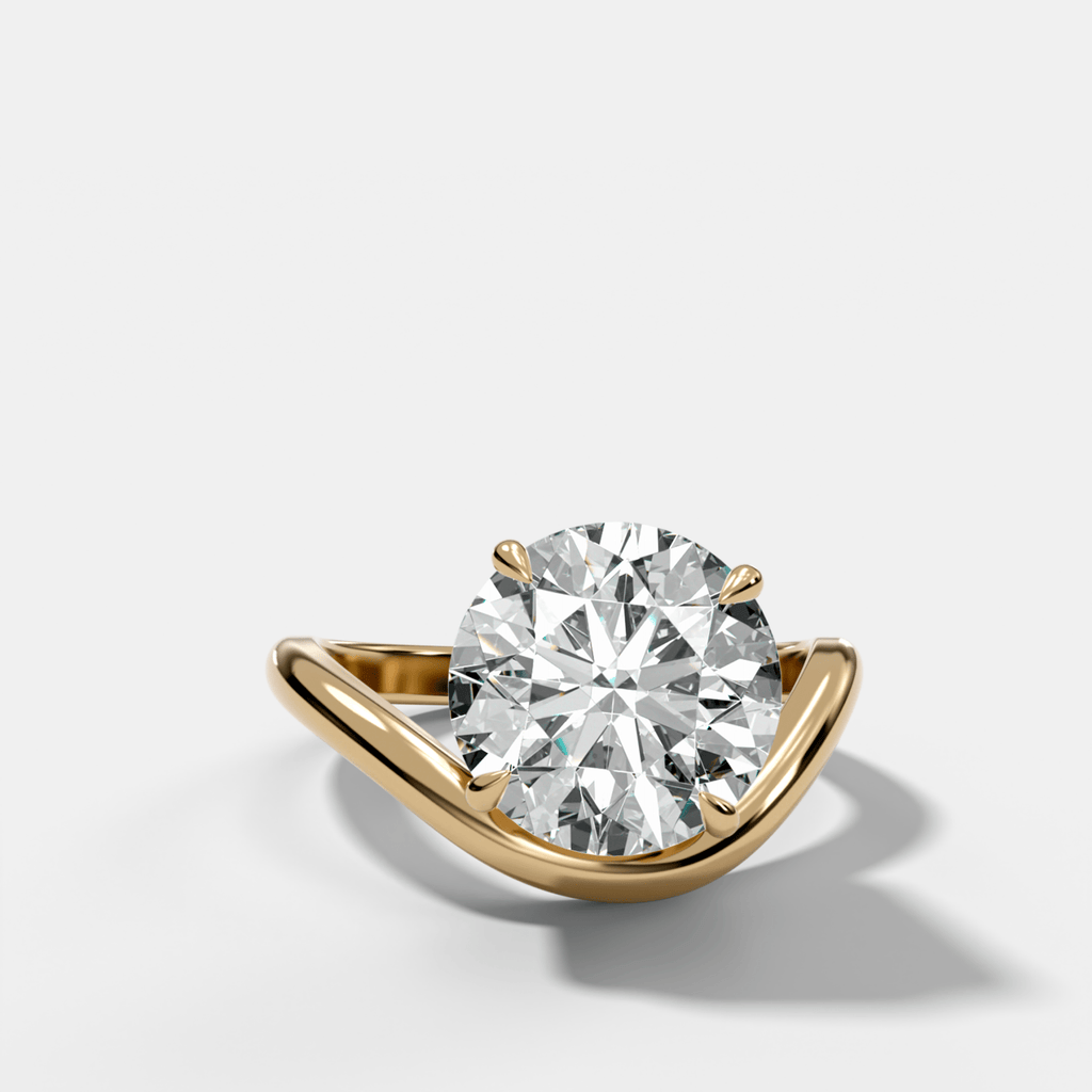 Contoured Engagement Ring with a Round Cut Diamond