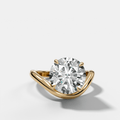 Contoured Engagement Ring with a Round Cut Diamond