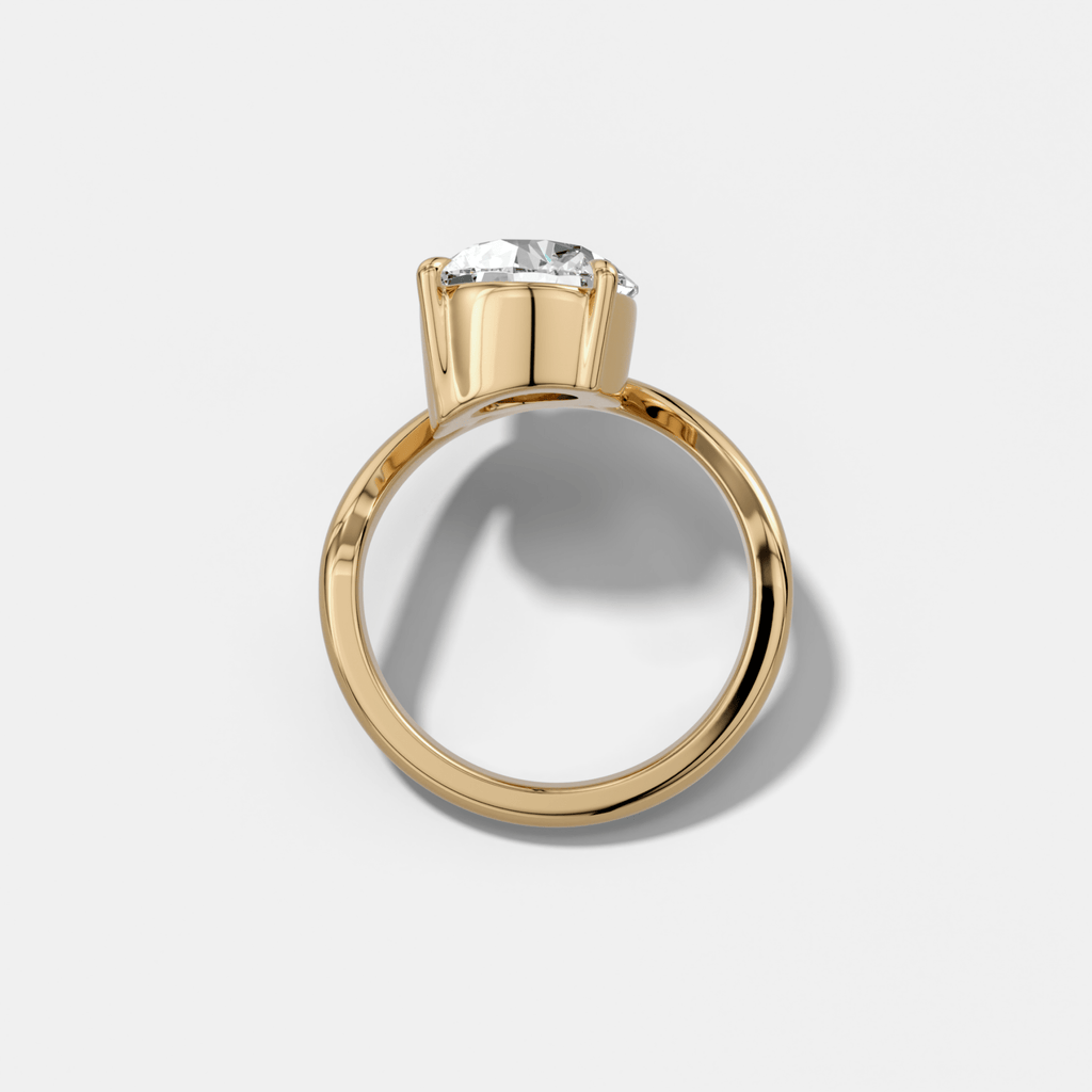 Contoured Engagement Ring with a Round Cut Diamond