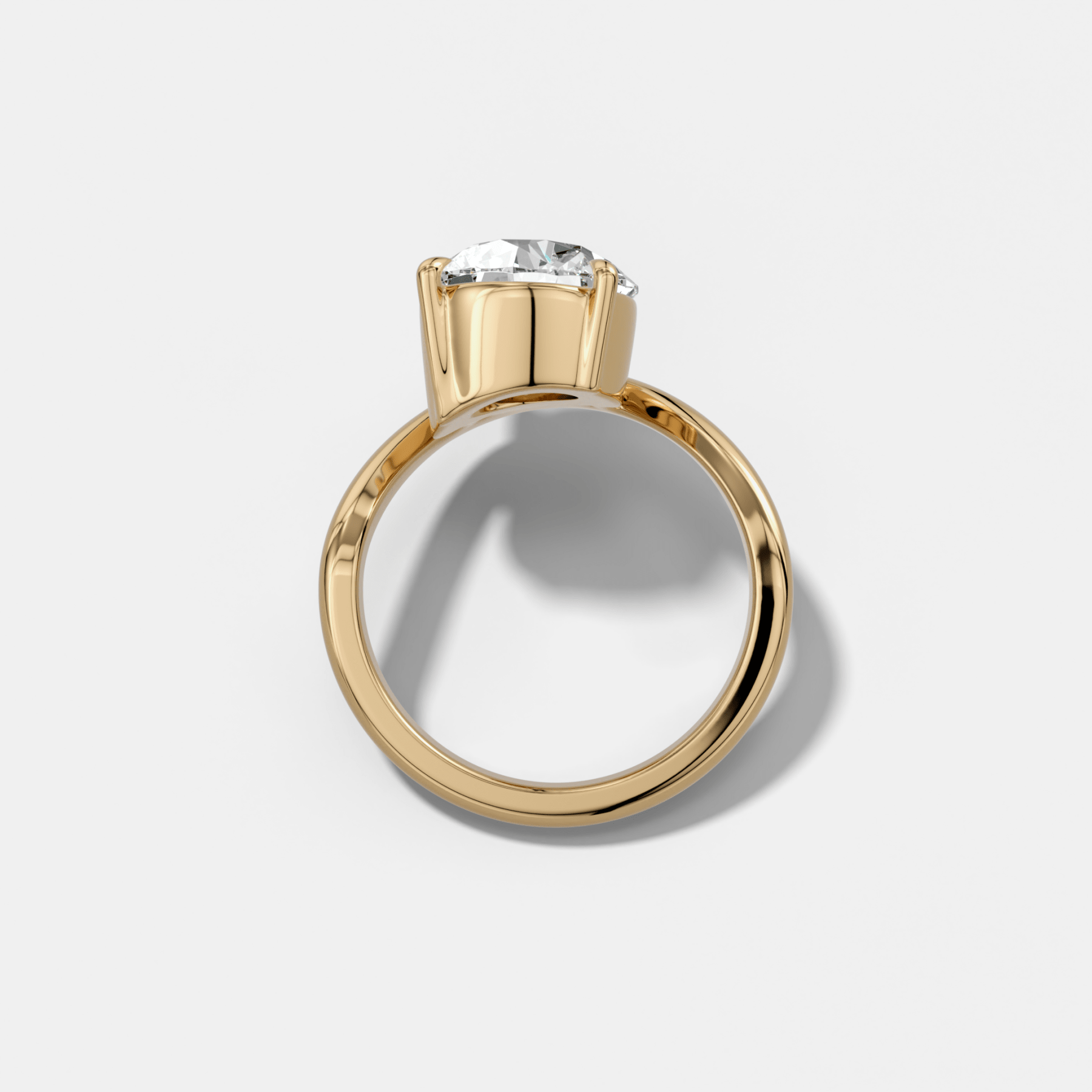 Contoured Engagement Ring with a Round Cut Diamond