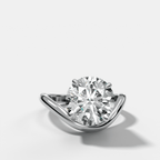 Contoured Engagement Ring with a Round Cut Diamond