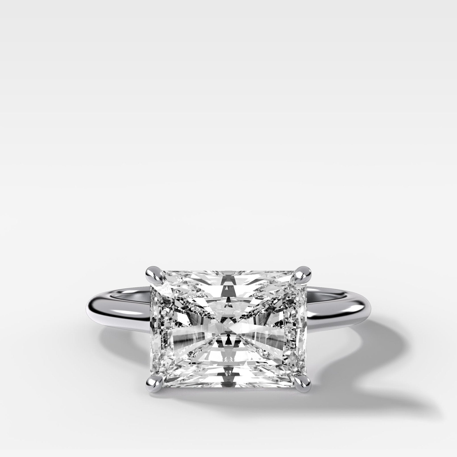 Crescent Solitaire Engagement Ring With Elongated Radiant Cut Diamond (East West)