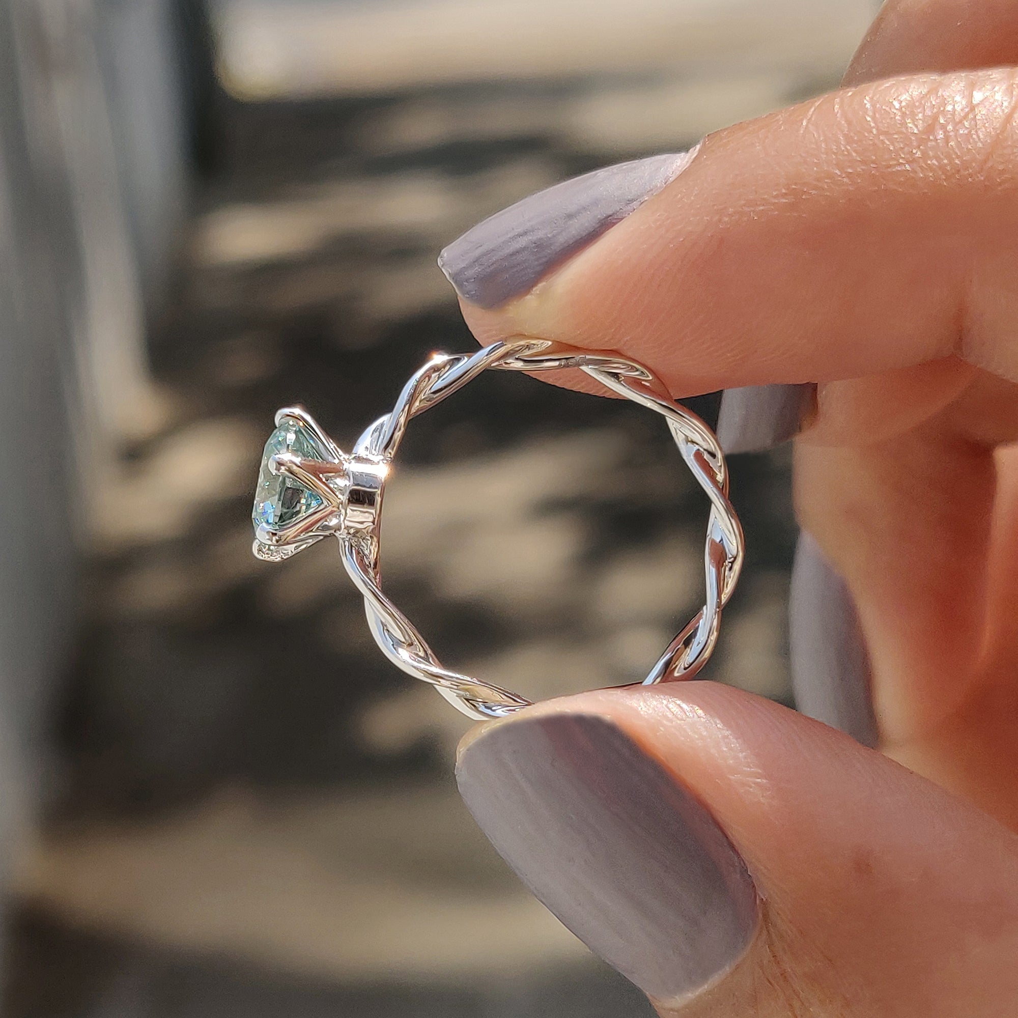 Round Solitaire Engagement Ring With Twisted Setting Secondary image
