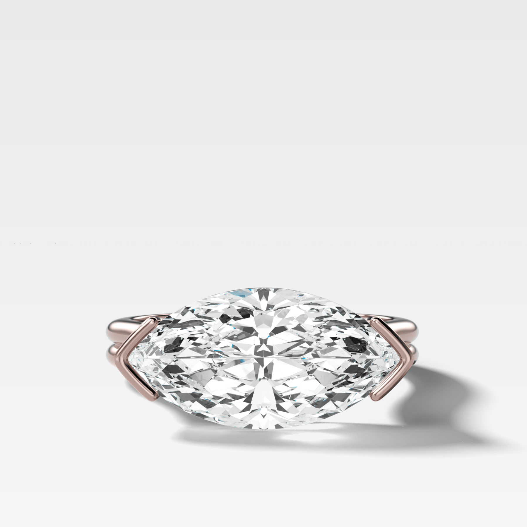 Double Row East West Half Bezel Solitaire Engagement Ring With Marquise Cut Diamond