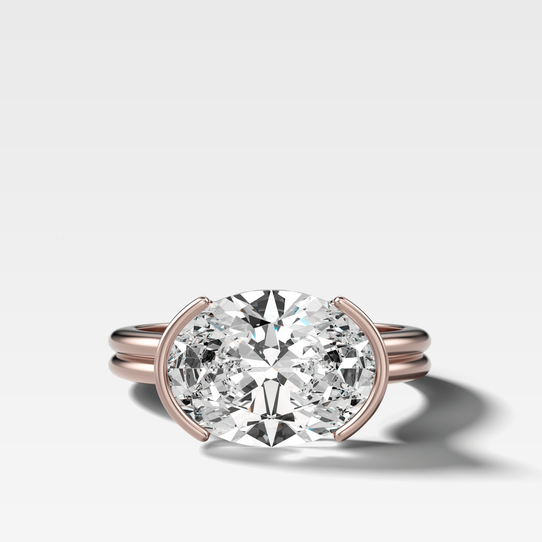 Double Row East West Half Bezel Solitaire Engagement Ring With Oval Cut Diamond
