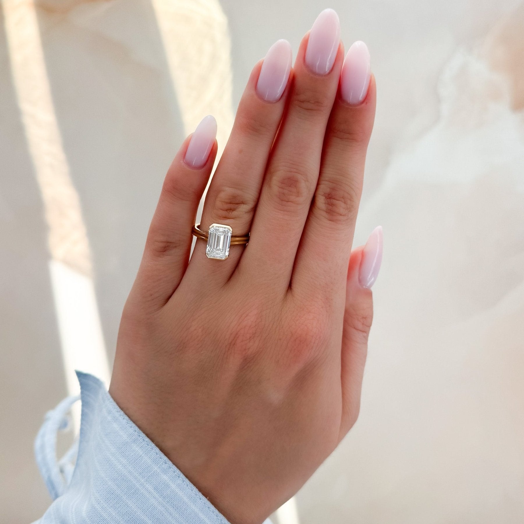 Double Row Half Bezel Solitaire Engagement Ring With Emerald Cut Diamond