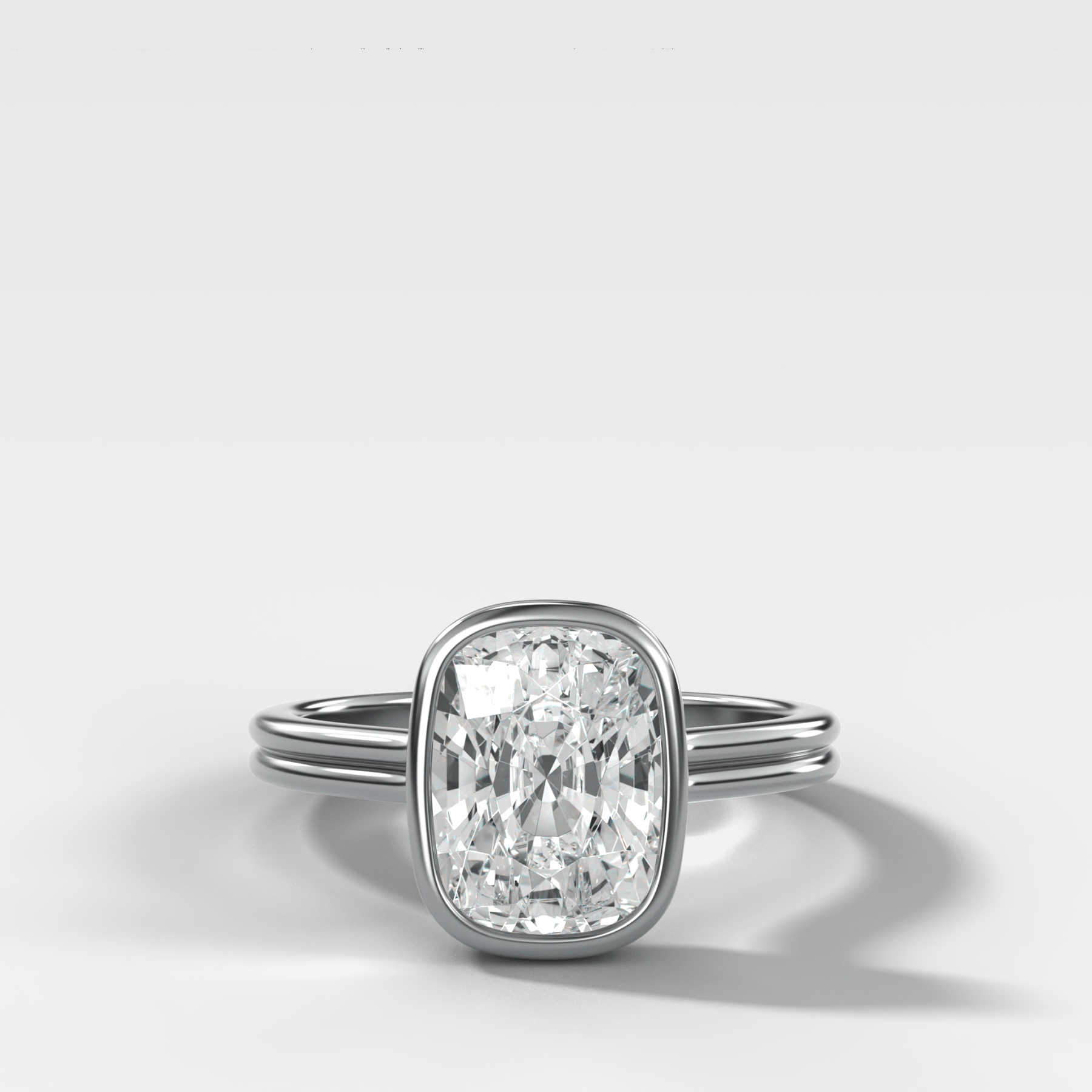 Double Row Penumbra Bezel Engagement Ring With Cushion Cut Diamond