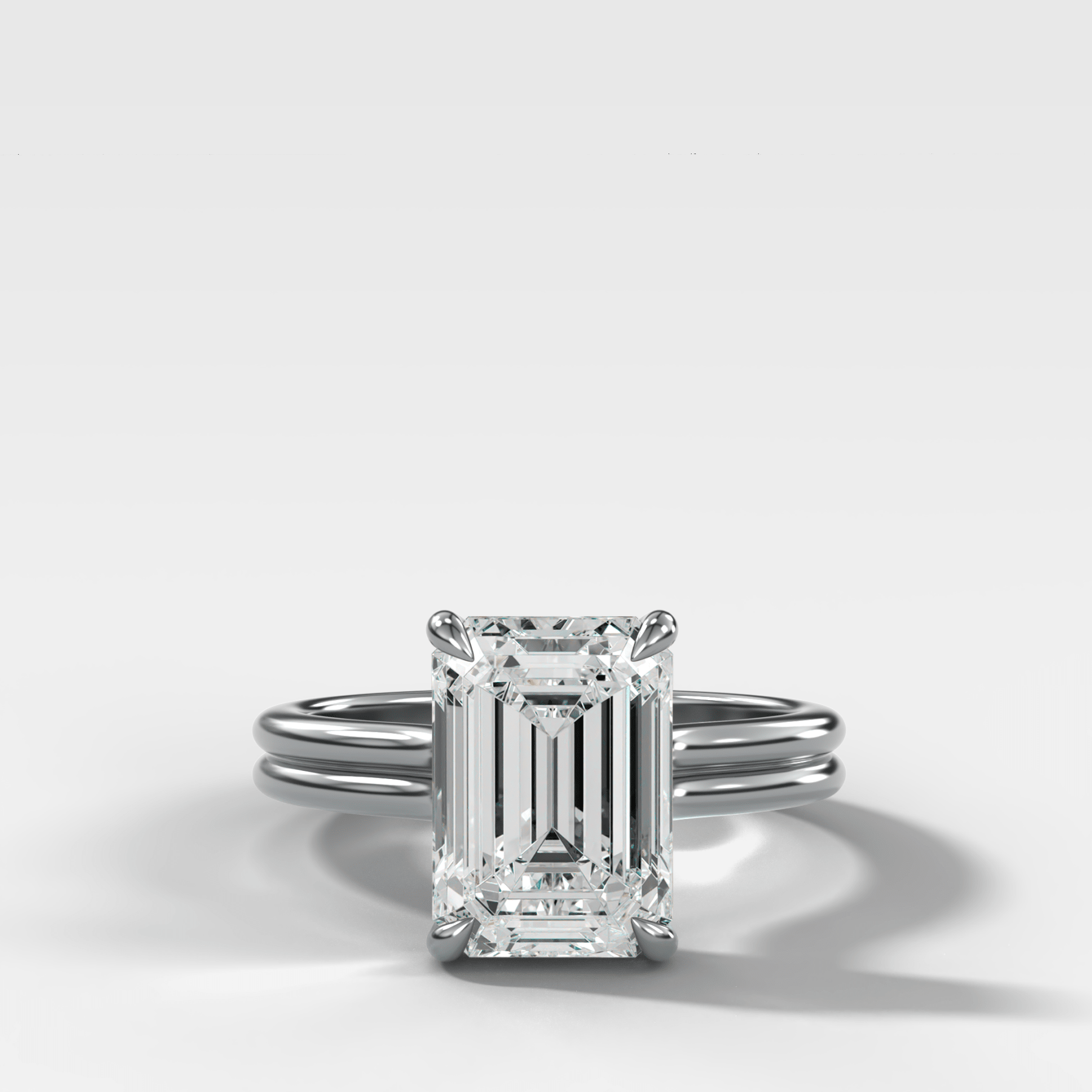 Double Row Solitaire Engagement Ring With Emerald Cut Diamond