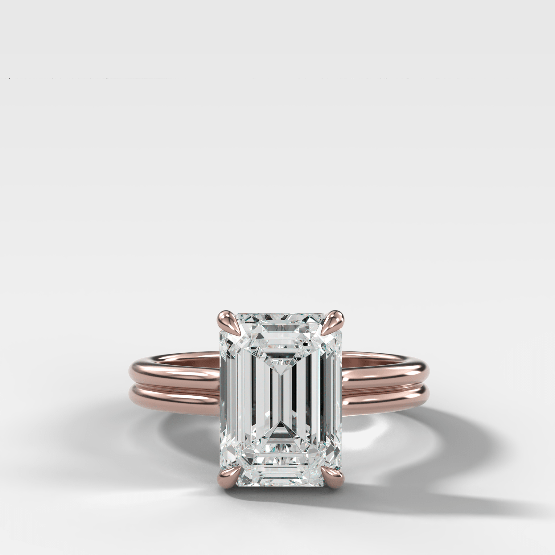 Double Row Solitaire Engagement Ring With Emerald Cut Diamond