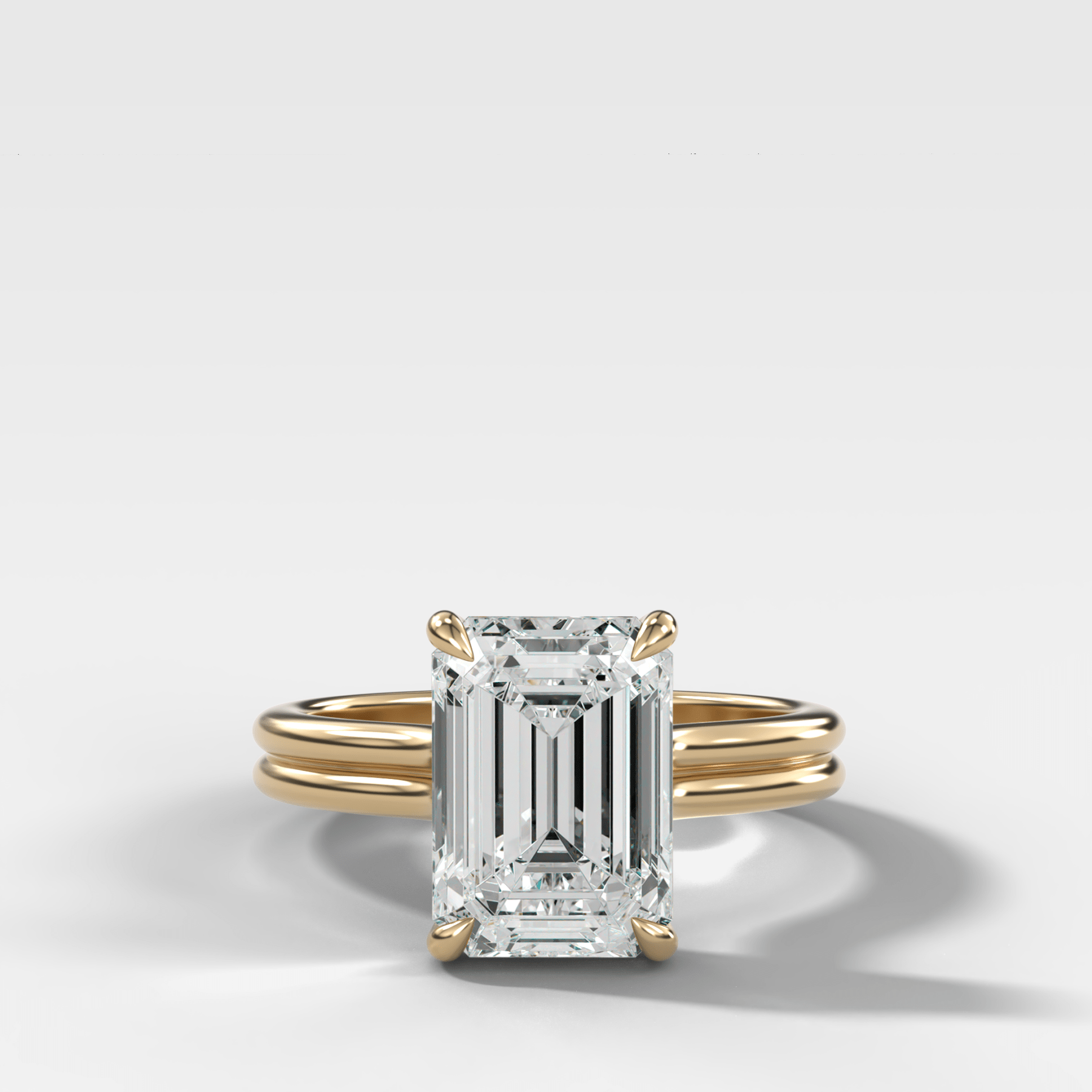 Double Row Solitaire Engagement Ring With Emerald Cut Diamond