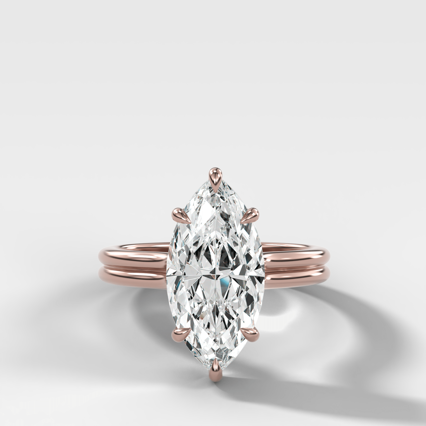 Double Row Solitaire Engagement Ring With Marquise Cut Diamond