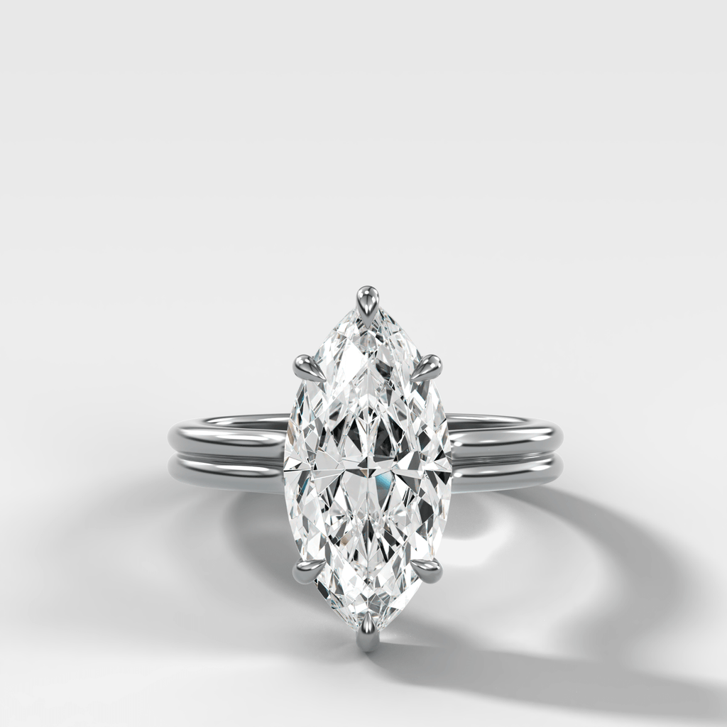 Double Row Solitaire Engagement Ring With Marquise Cut Diamond