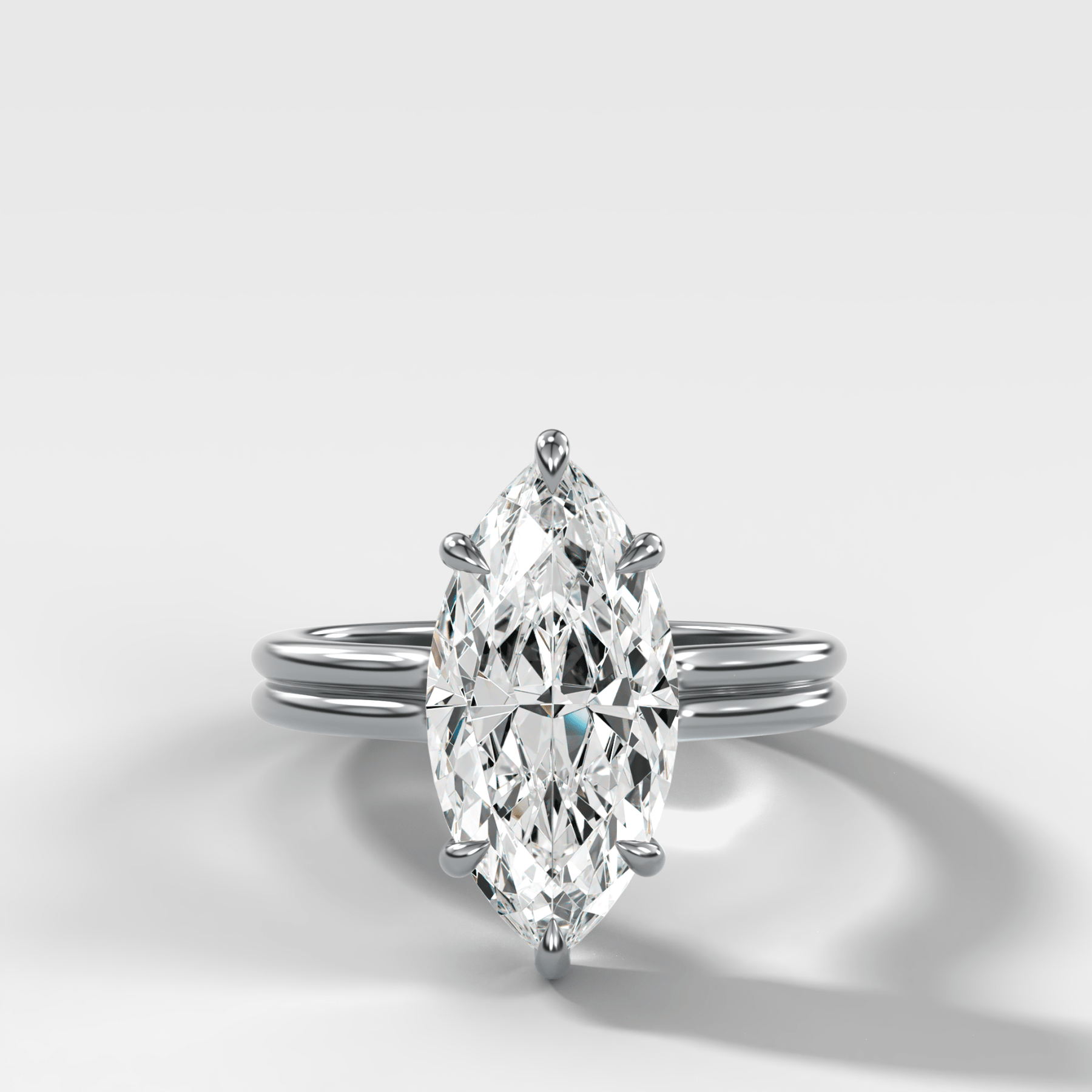 Double Row Solitaire Engagement Ring With Marquise Cut Diamond