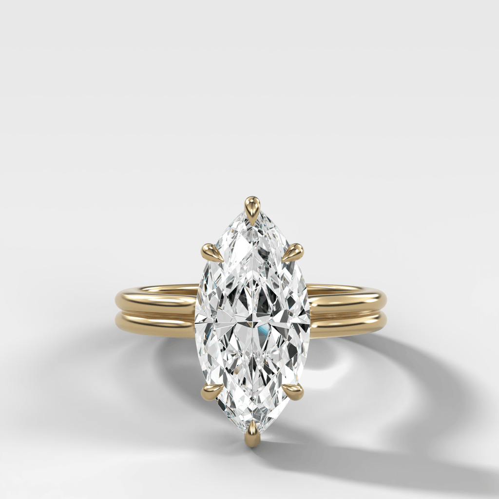 Double Row Solitaire Engagement Ring With Marquise Cut Diamond
