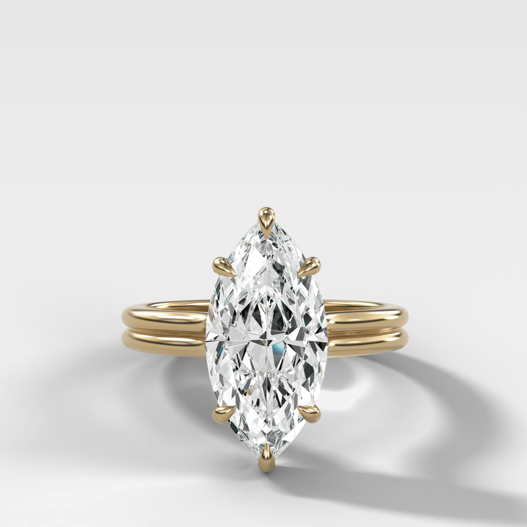Double Row Solitaire Engagement Ring With Marquise Cut Diamond