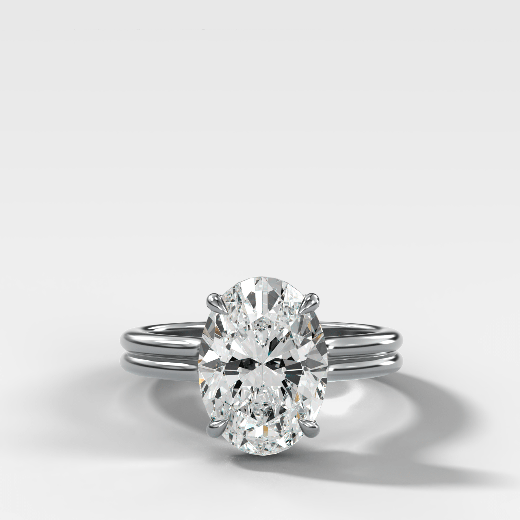 Double Row Solitaire Engagement Ring With Oval Cut Diamond