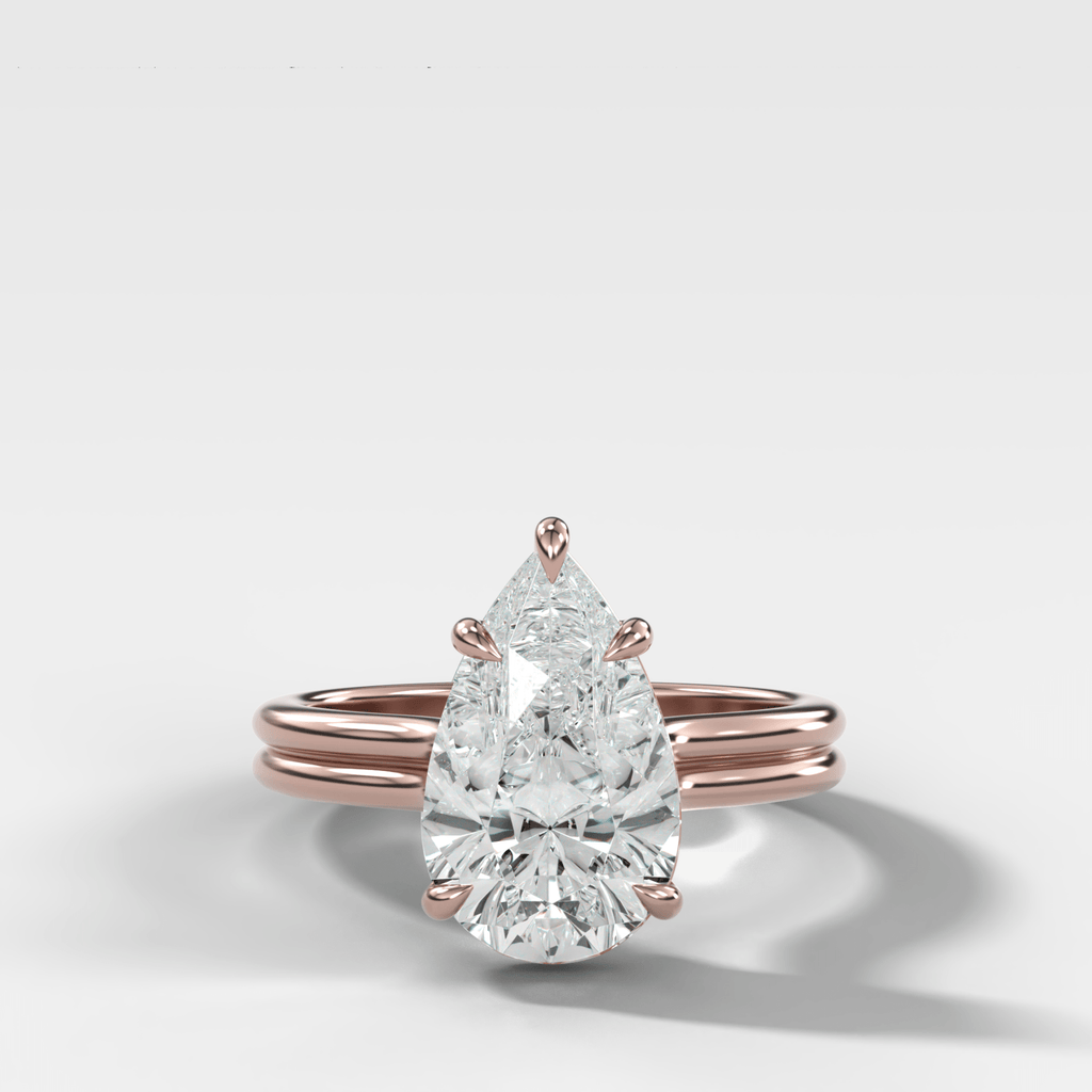 Double Row Solitaire Engagement Ring With Pear Cut Diamond