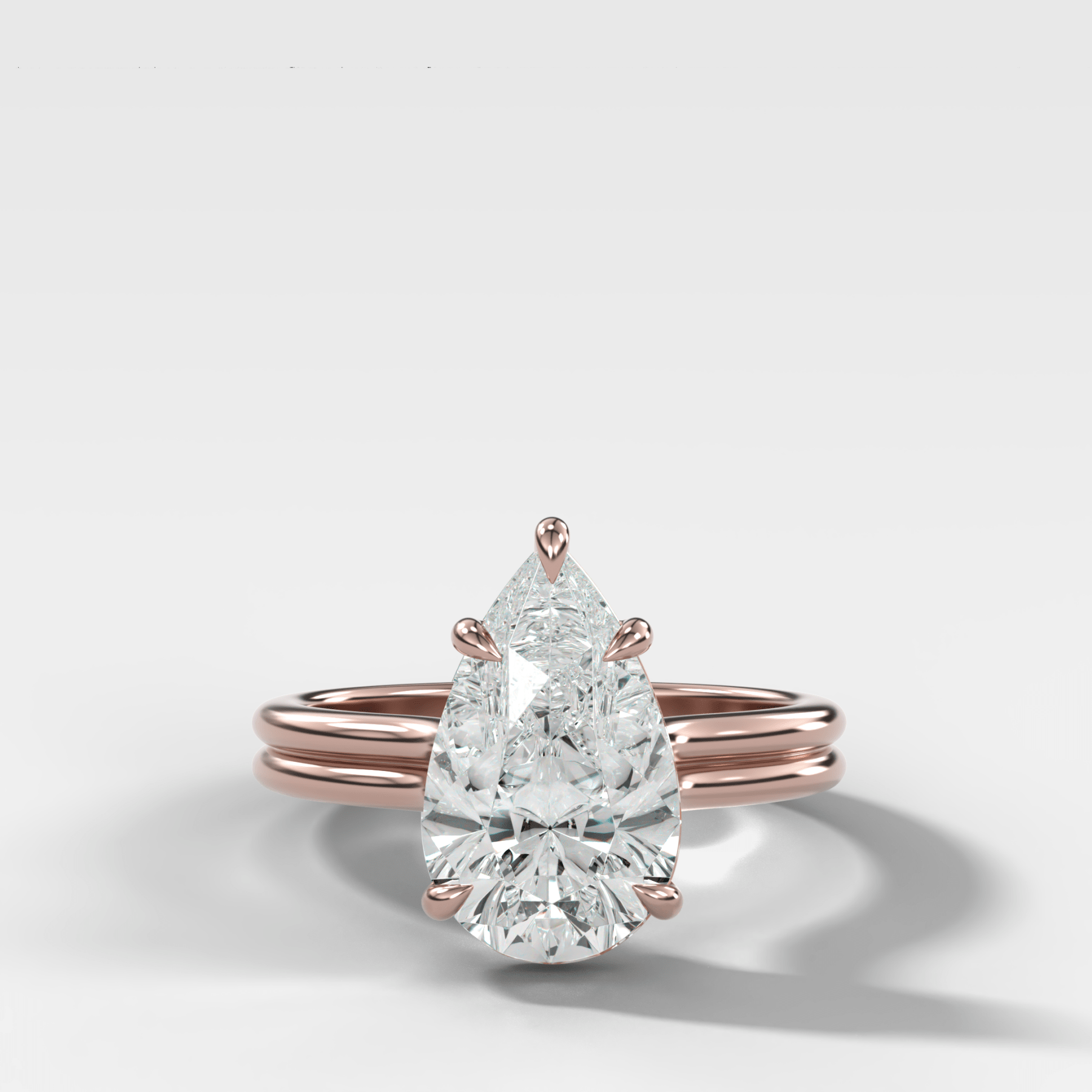 Double Row Solitaire Engagement Ring With Pear Cut Diamond