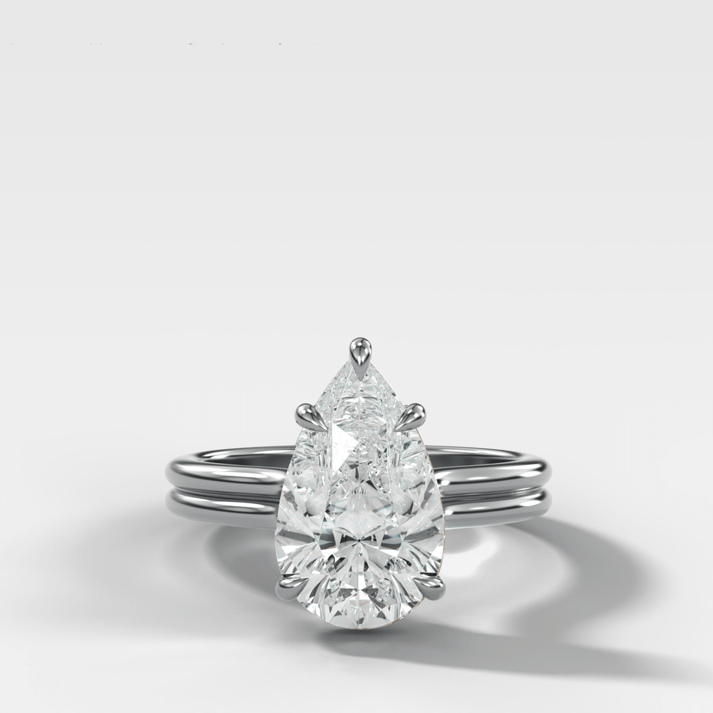 Double Row Solitaire Engagement Ring With Pear Cut Diamond