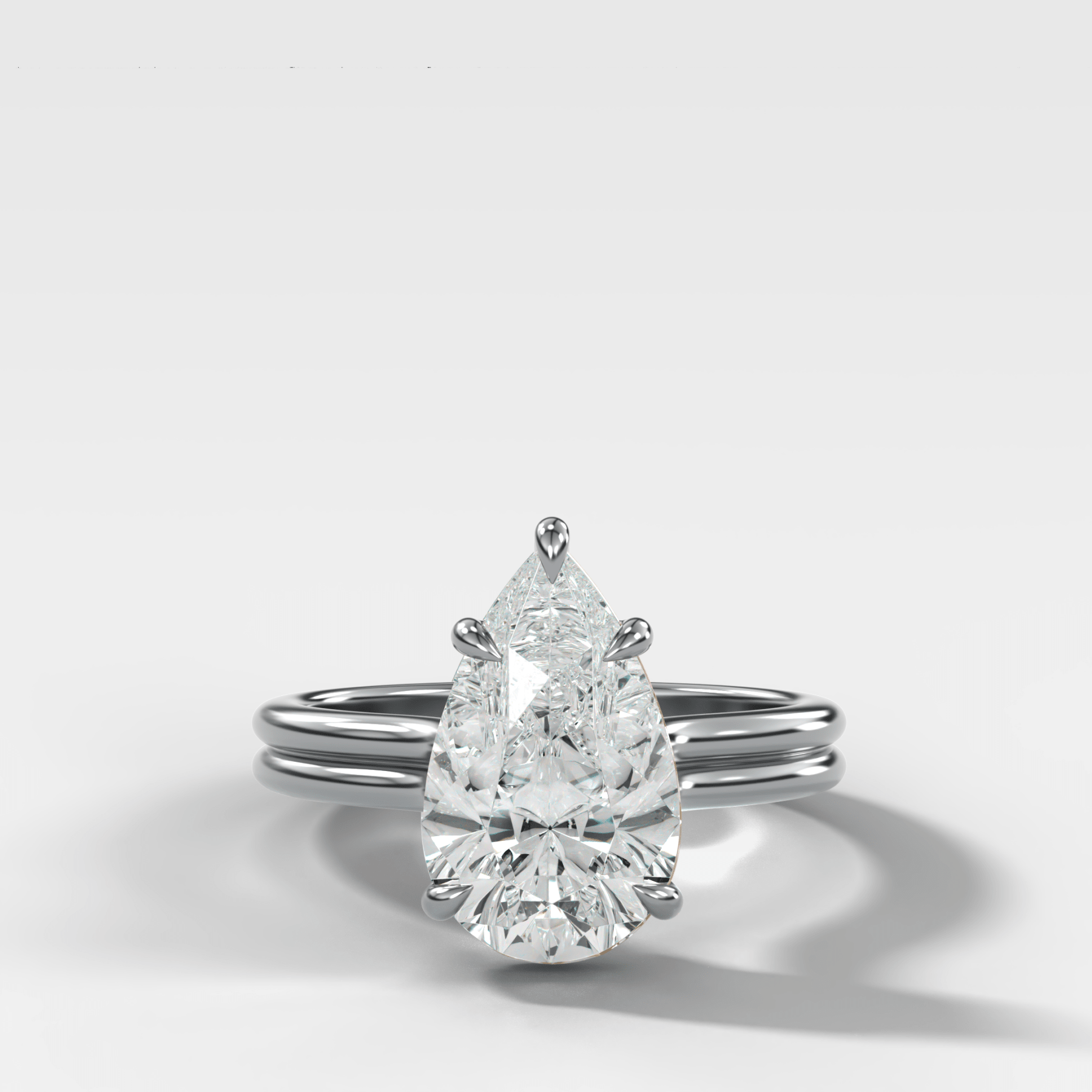 Double Row Solitaire Engagement Ring With Pear Cut Diamond