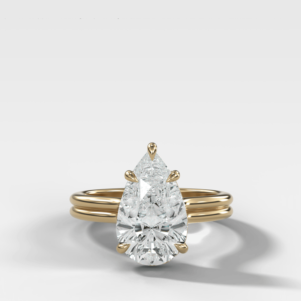 Double Row Solitaire Engagement Ring With Pear Cut Diamond