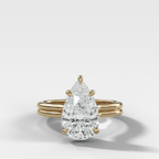 Double Row Solitaire Engagement Ring With Pear Cut Diamond