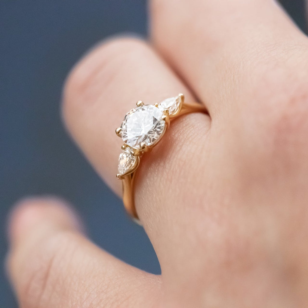 1.0 CT Round Cut Three Stone Style Moissanite Engagement Ring