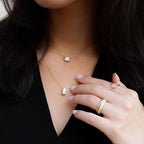 East West Bezel Pendant Necklace with Emerald Cut Diamond