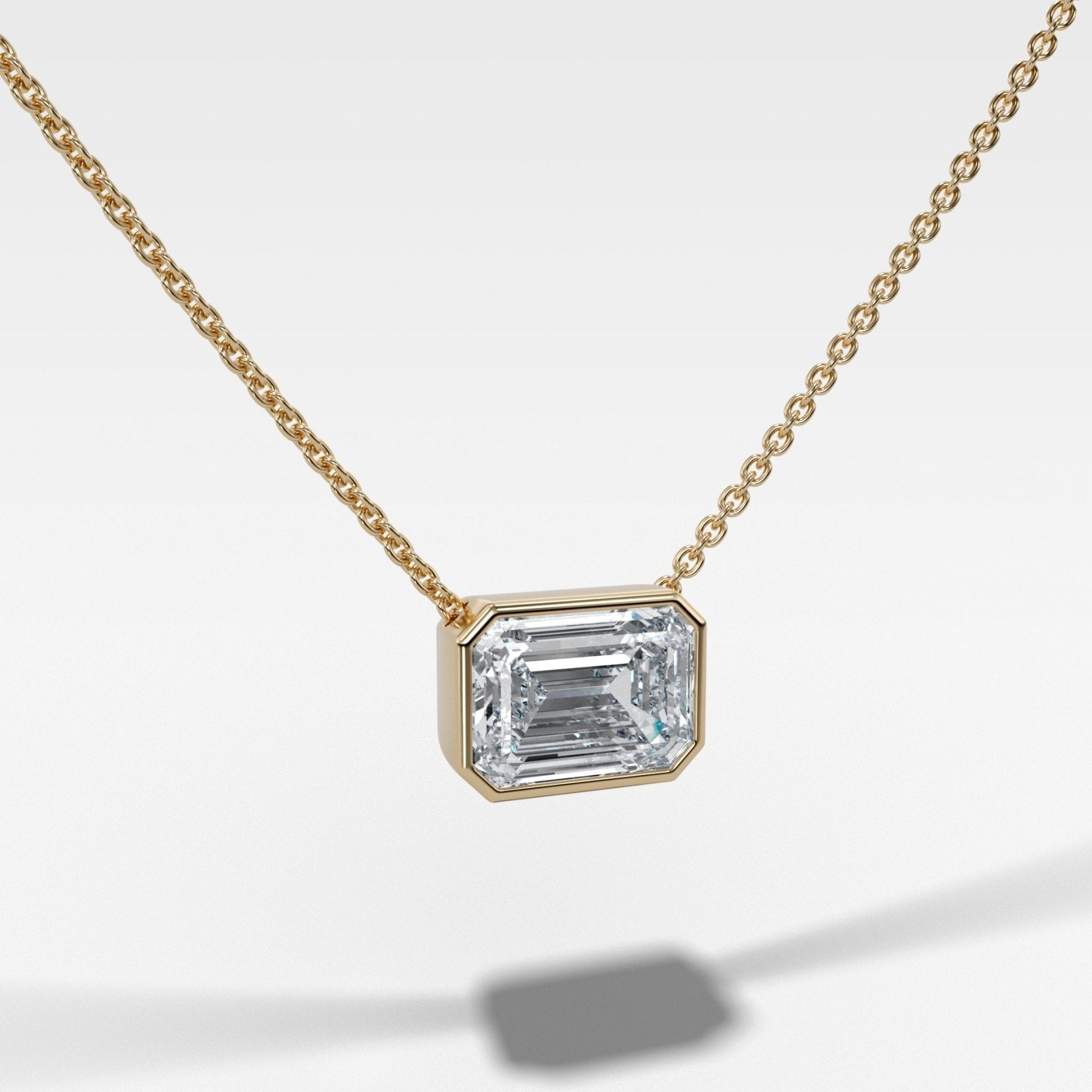 East West Bezel Pendant Necklace with Emerald Cut Diamond