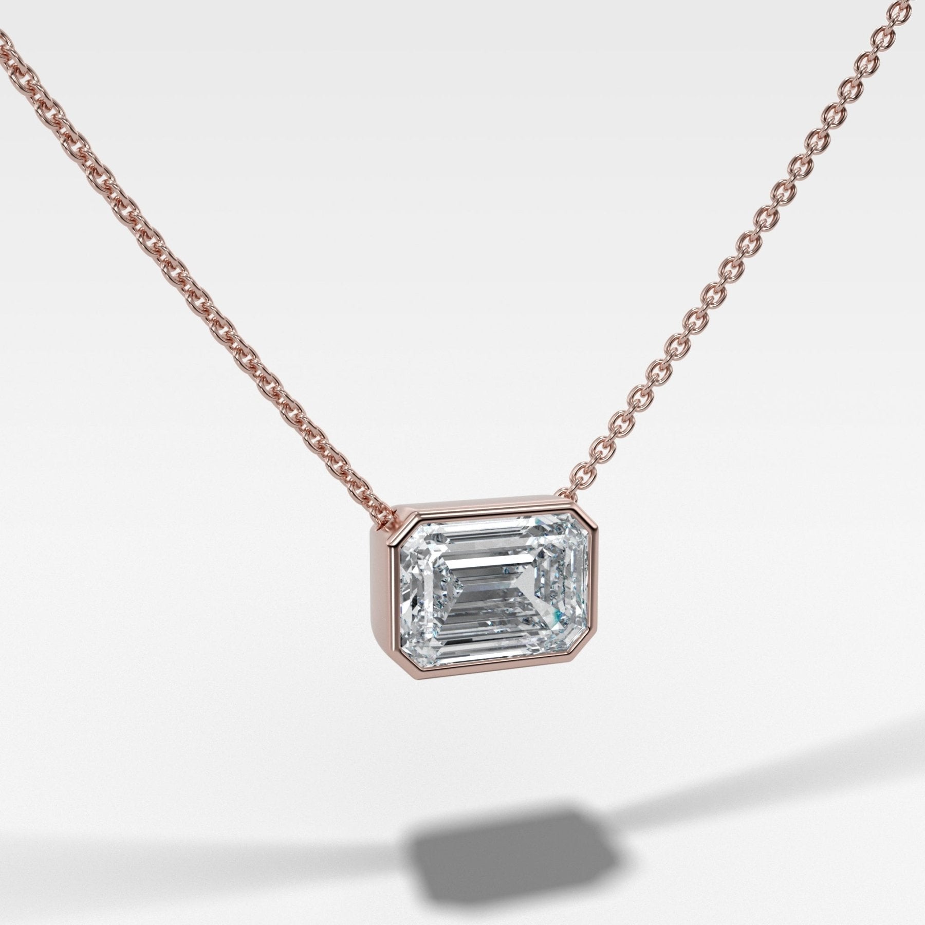 East West Bezel Pendant Necklace with Emerald Cut Diamond