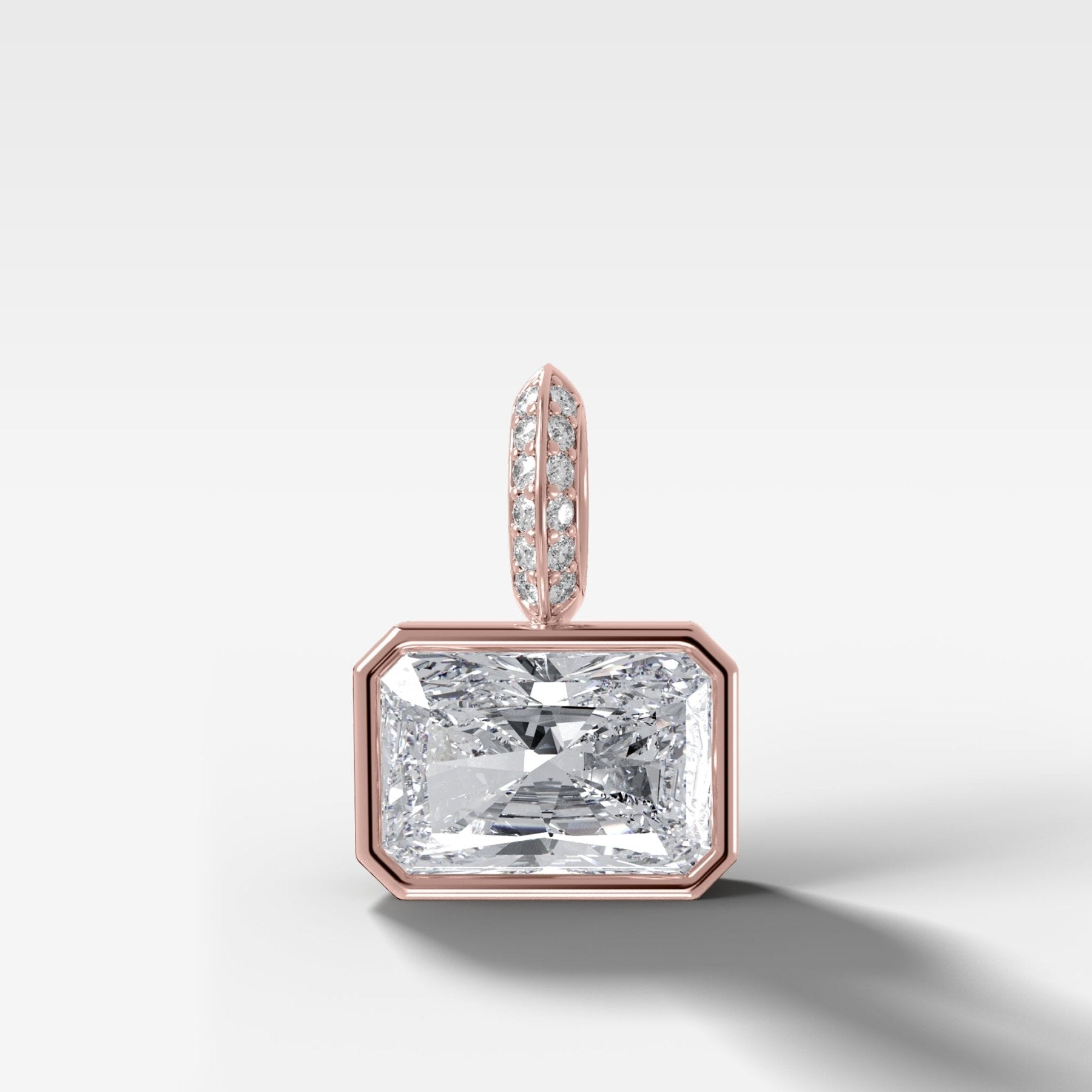 East West Bezel Set Elongated Radiant Attachable Diamond Pendant with Pavé Knife Edge Bail