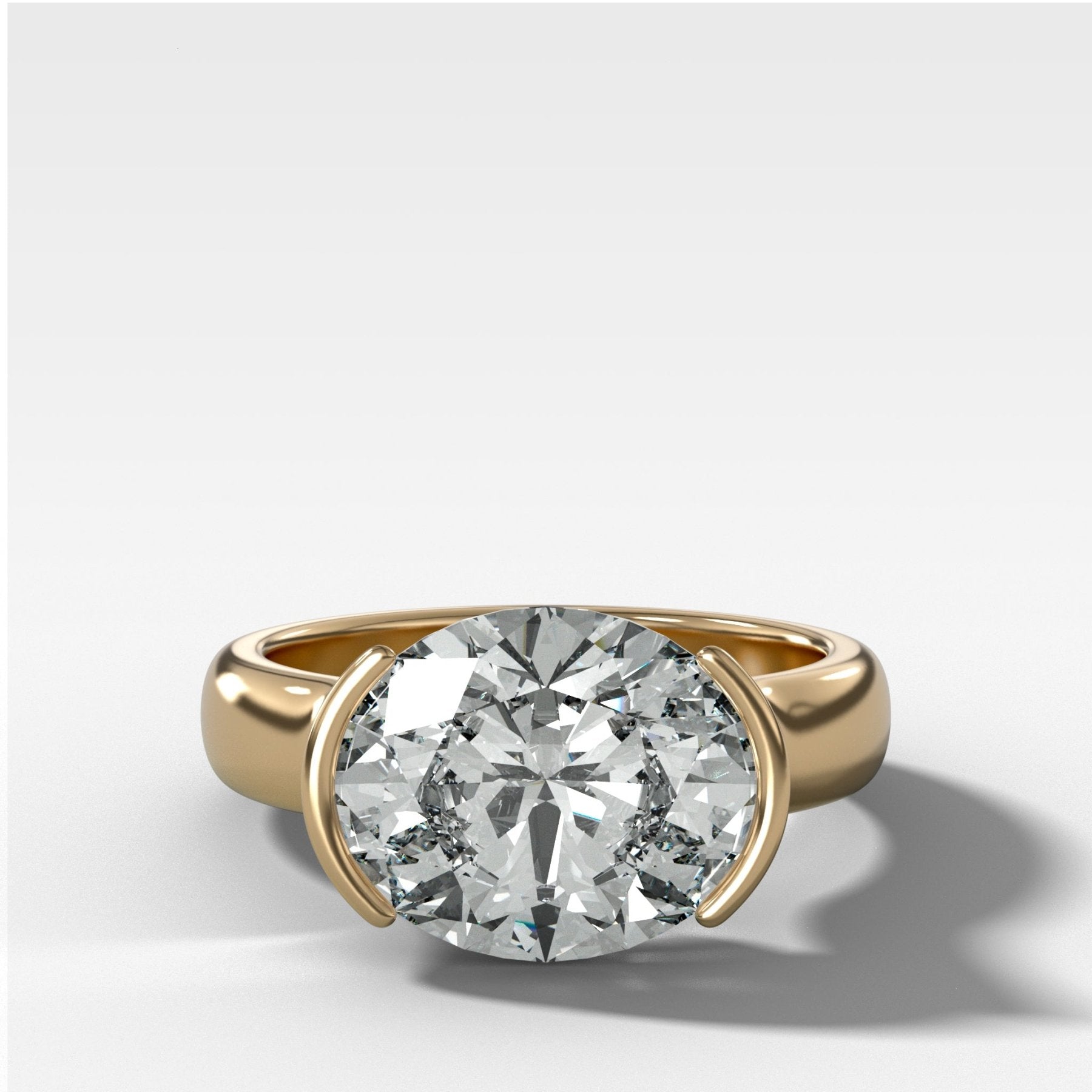 East West Half Bezel 4mm Solitaire Engagement Ring With Oval Cut Diamond