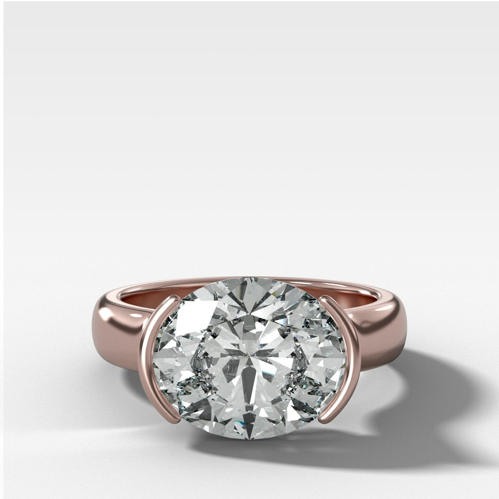 East West Half Bezel 4mm Solitaire Engagement Ring With Oval Cut Diamond