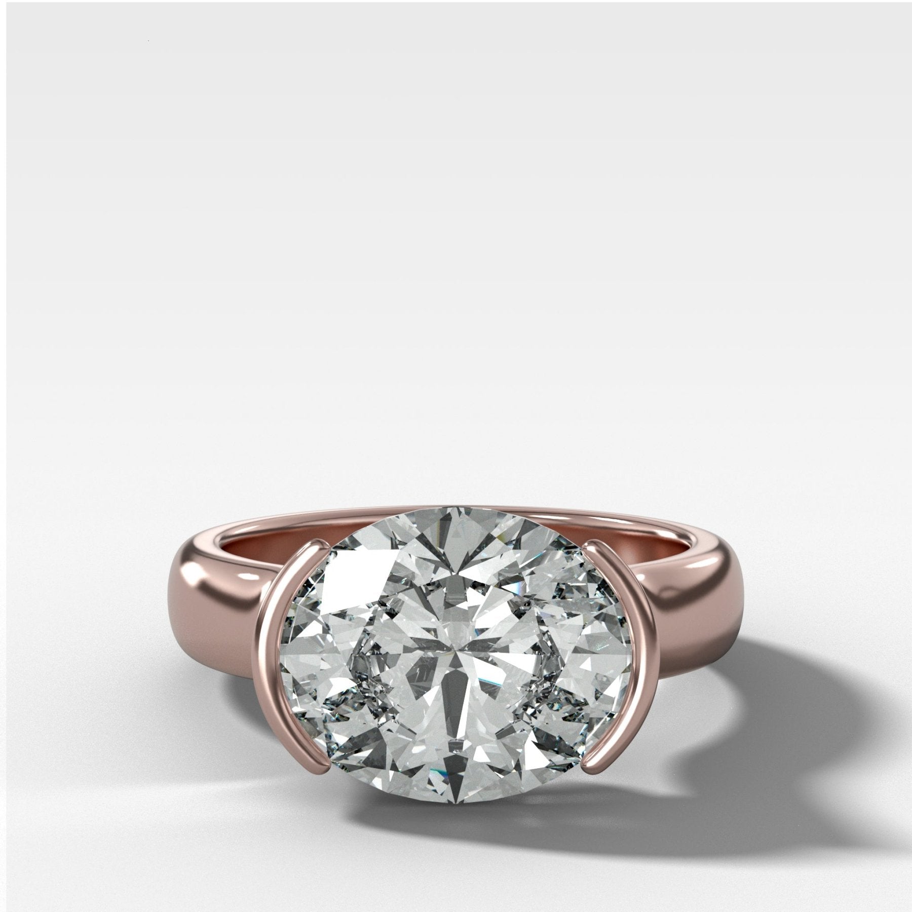 East West Half Bezel 4mm Solitaire Engagement Ring With Oval Cut Diamond