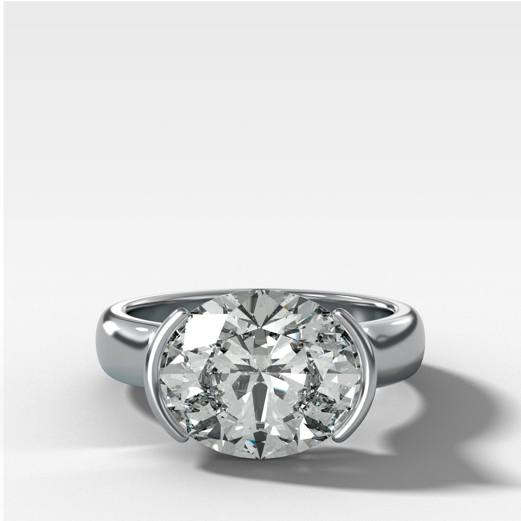 East West Half Bezel 4mm Solitaire Engagement Ring With Oval Cut Diamond