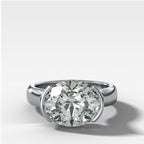 East West Half Bezel 4mm Solitaire Engagement Ring With Oval Cut Diamond
