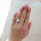 East West Half Bezel 4mm Solitaire Engagement Ring With Oval Cut Diamond