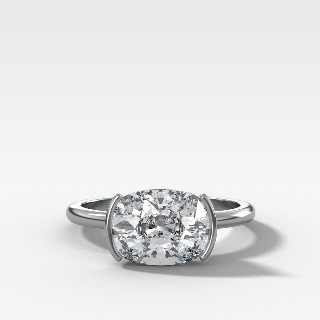 East West Half Bezel Solitaire Engagement Ring With Elongated Cushion Cut Diamond