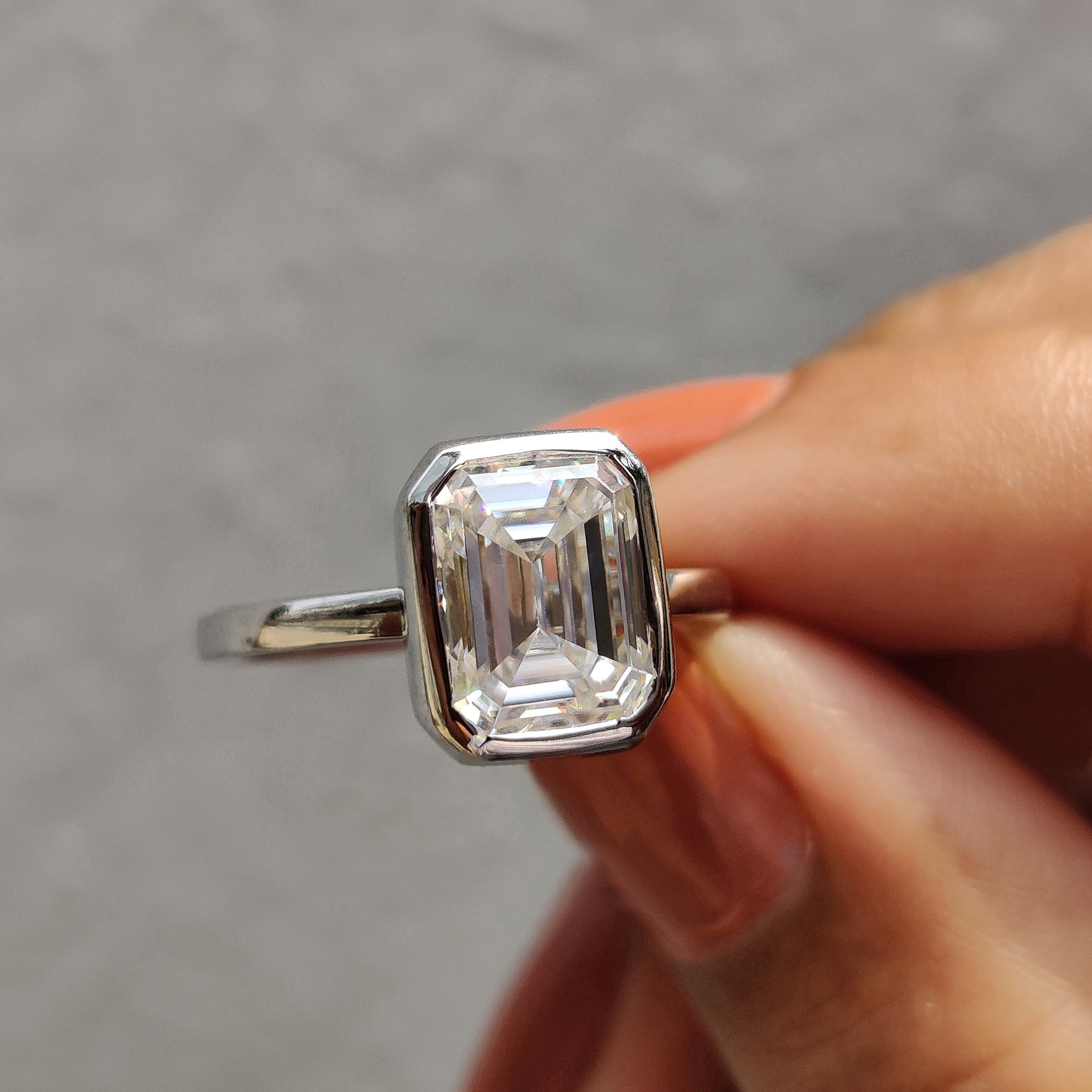 Emerald Cut Bezel Ring in Classic Solitaire Setting