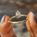 Pear Shaped Engagement Ring in Round Cut Pave Band